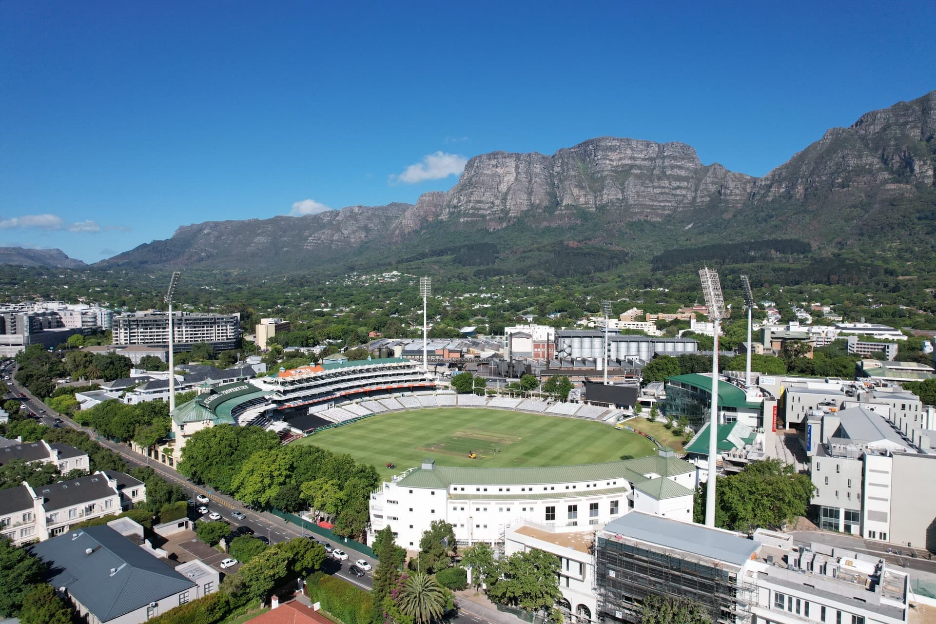 Aerial view of Newlands Cricket Ground in Cape Town with Table Mountain rising behind it